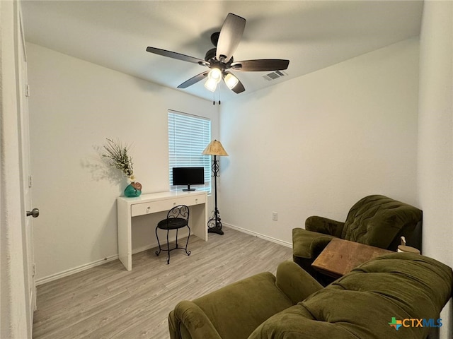 office area featuring ceiling fan and light wood-type flooring