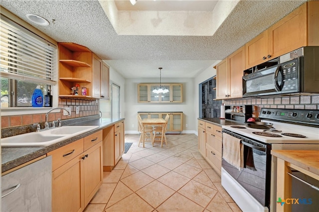 kitchen featuring pendant lighting, light tile patterned flooring, a textured ceiling, and electric stove