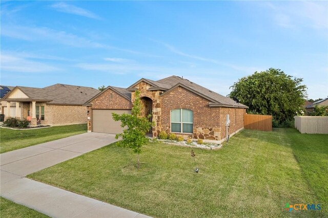 206 Danielle Dr, Killeen, TX 76542 - ranch-style home with brick siding, driveway, and a garage