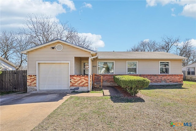 ranch-style home with a garage, brick siding, fence, driveway, and a front yard