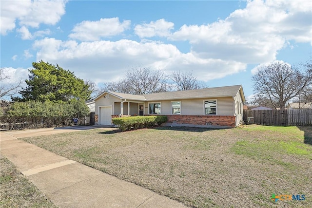 ranch-style house with brick siding, concrete driveway, fence, a garage, and a front lawn