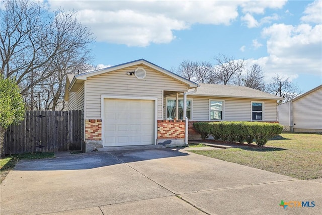 single story home with a garage, driveway, fence, a front lawn, and brick siding