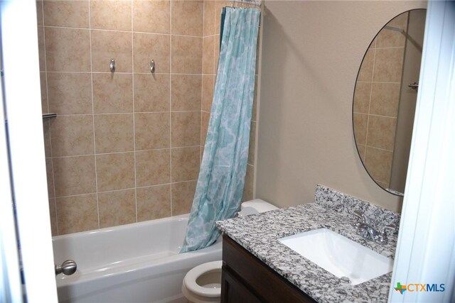 1204 N 18th St, Killeen, TX 76541 - full bath with shower / bath combo with shower curtain, toilet, and vanity