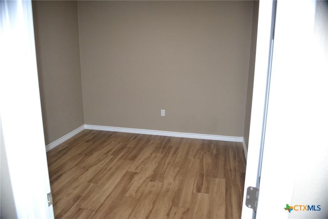 1204 N 18th St, Killeen, TX 76541 - empty room featuring light wood-type flooring and baseboards
