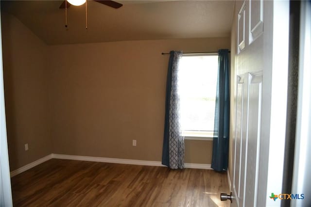 1204 N 18th St, Killeen, TX 76541 - unfurnished room with wood finished floors, a ceiling fan, and baseboards