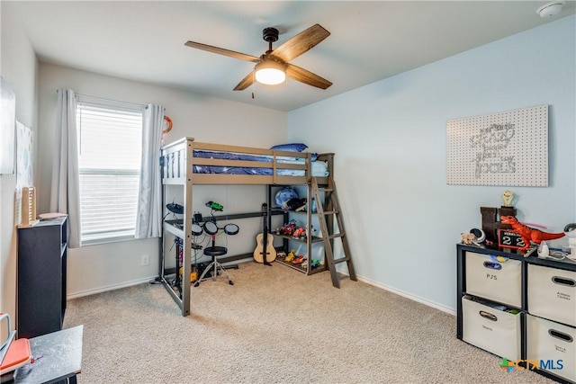 bedroom featuring light carpet, multiple windows, and ceiling fan