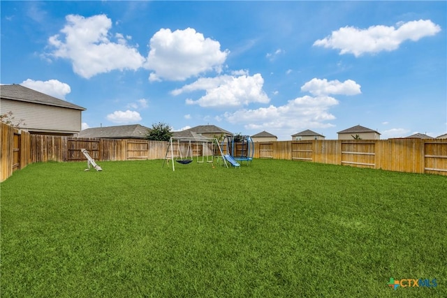 view of yard with a playground