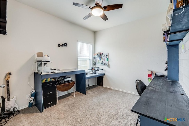 carpeted office with ceiling fan