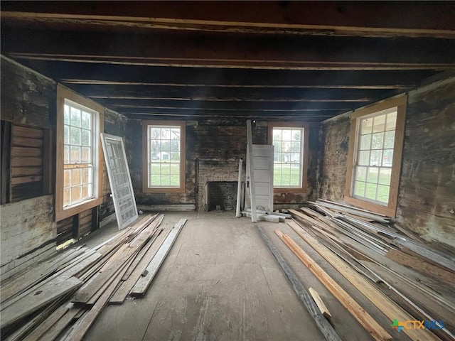 misc room featuring a stone fireplace