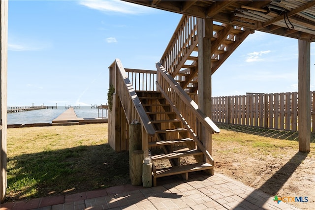 view of patio featuring a water view