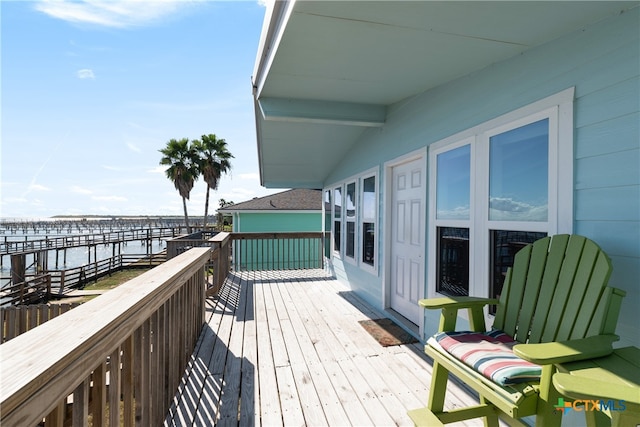 deck featuring a water view