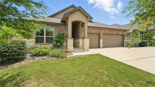 3542 Hurricane Trl, New Braunfels, TX 78130 - view of front facade with brick siding, a garage, driveway, a front yard, and stone siding