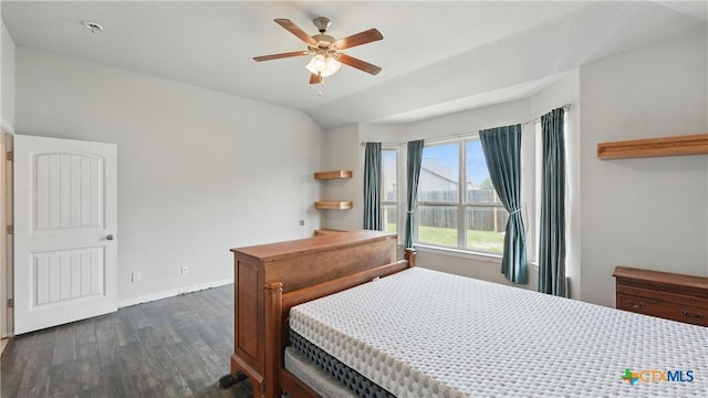 3542 Hurricane Trl, New Braunfels, TX 78130 - bedroom featuring dark wood-type flooring, baseboards, vaulted ceiling, and a ceiling fan