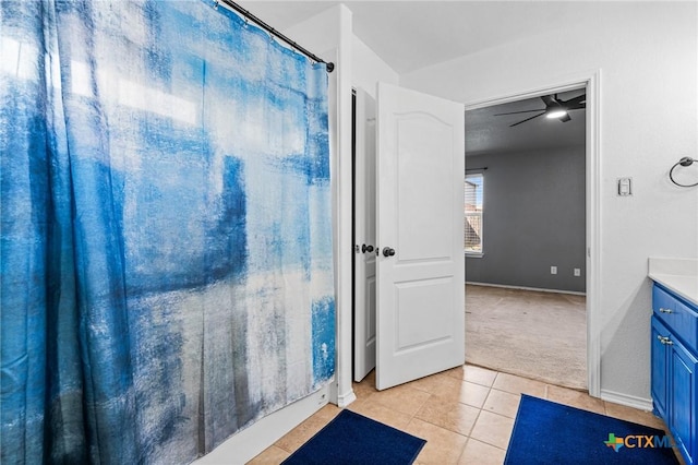 bathroom with tile patterned floors and vanity