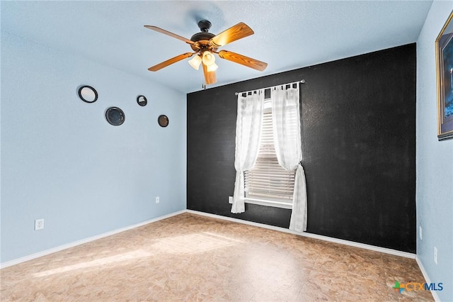 empty room with ceiling fan