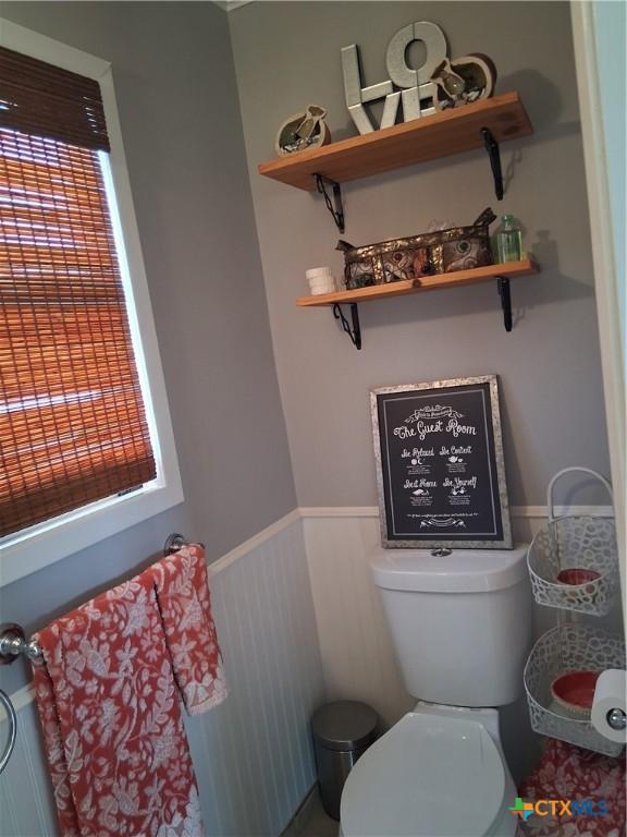 1837 Colleen Dr, Canyon Lake, TX 78133 - bathroom with wainscoting and toilet