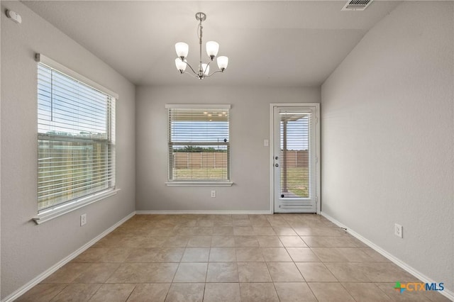 2048 Wigeon Way, Copperas Cove, TX 76522 - empty room with a chandelier and light tile patterned floors