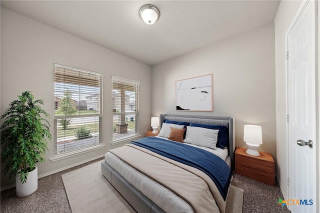 2048 Wigeon Way, Copperas Cove, TX 76522 - carpeted bedroom with baseboards
