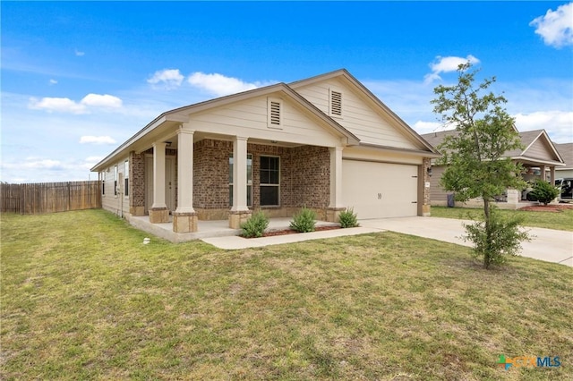 2048 Wigeon Way, Copperas Cove, TX 76522 - view of front facade with driveway, a porch, brick siding, and a garage
