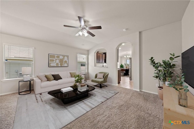 2048 Wigeon Way, Copperas Cove, TX 76522 - carpeted living room featuring a ceiling fan and arched walkways
