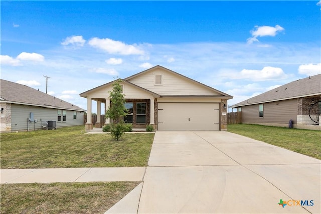 2048 Wigeon Way, Copperas Cove, TX 76522 - view of front facade with an attached garage, driveway, brick siding, and covered porch