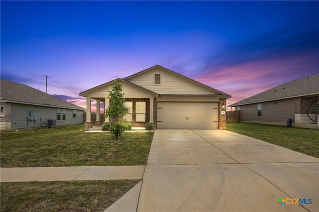 2048 Wigeon Way, Copperas Cove, TX 76522 - ranch-style house with concrete driveway, an attached garage, brick siding, and a porch