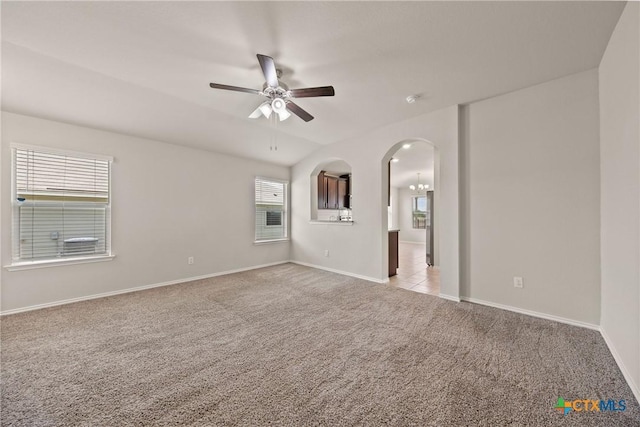 2048 Wigeon Way, Copperas Cove, TX 76522 - unfurnished room with a ceiling fan, light colored carpet, arched walkways, and a smoke detector