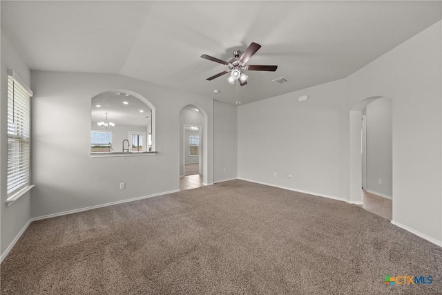 2048 Wigeon Way, Copperas Cove, TX 76522 - carpeted spare room with arched walkways, a ceiling fan, and plenty of natural light