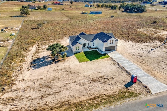 bird's eye view with a rural view