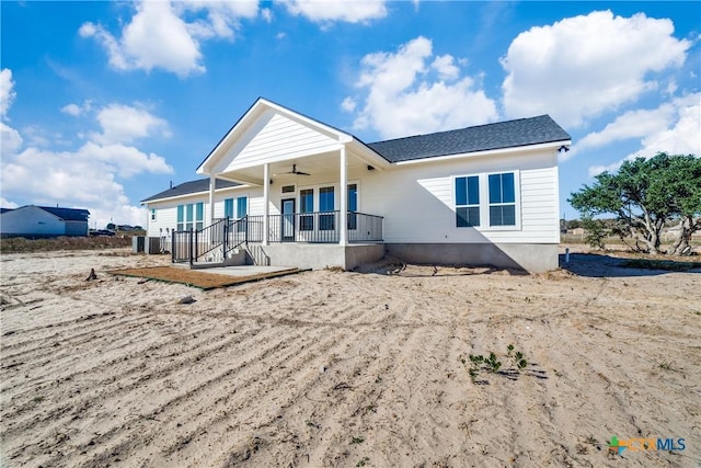 view of front of home featuring ceiling fan and a porch