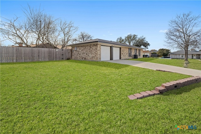 view of yard with a garage