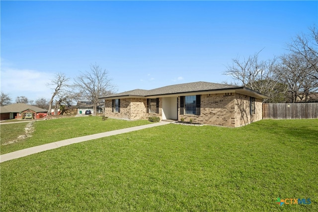 single story home featuring a front yard