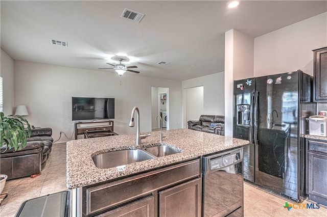 kitchen featuring black appliances, sink, dark brown cabinetry, and ceiling fan