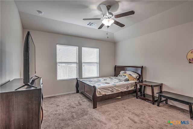 carpeted bedroom featuring ceiling fan