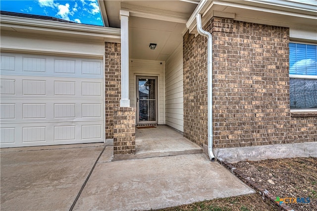 property entrance featuring a garage