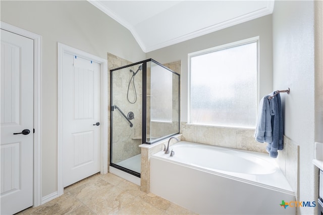 bathroom with independent shower and bath, a healthy amount of sunlight, and lofted ceiling