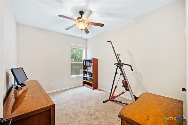 office space featuring light colored carpet and ceiling fan