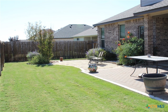 view of yard with a patio area