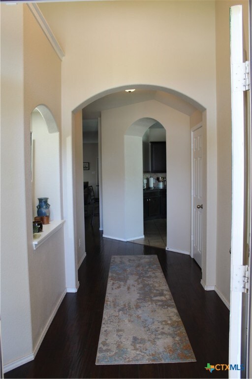 hall featuring dark hardwood / wood-style flooring