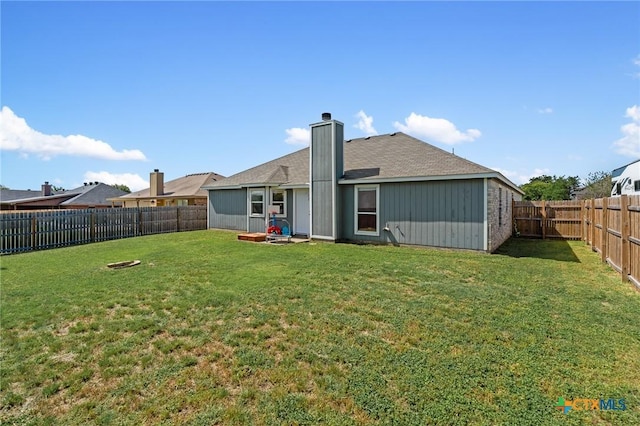 1801 Caprock Dr, Killeen, TX 76549 - rear view of property with a fenced backyard and a chimney