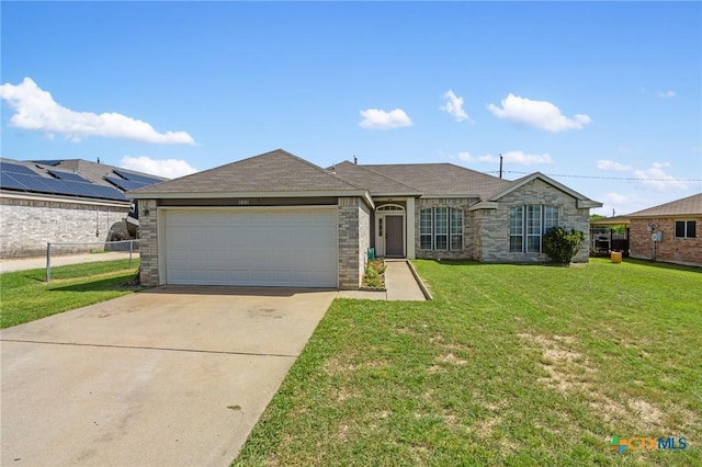 1801 Caprock Dr, Killeen, TX 76549 - single story home featuring concrete driveway, a garage, a shingled roof, and brick siding