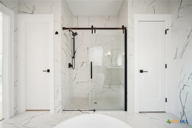 bathroom with shower with separate bathtub