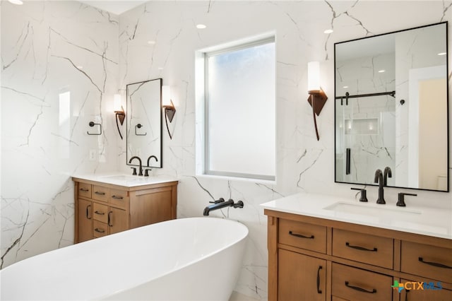 bathroom featuring tile walls, vanity, and plus walk in shower