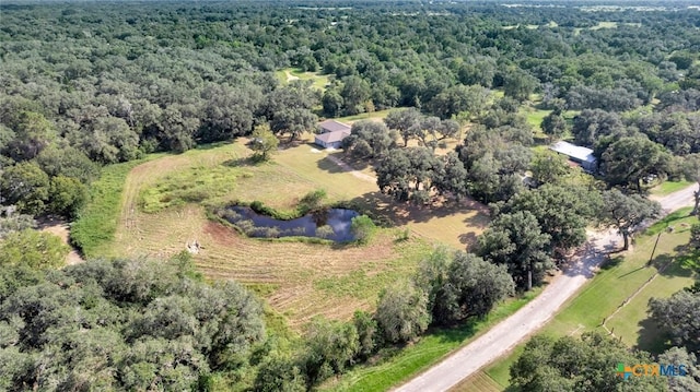 birds eye view of property with a rural view