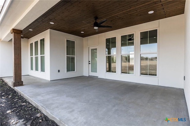 view of patio featuring a ceiling fan