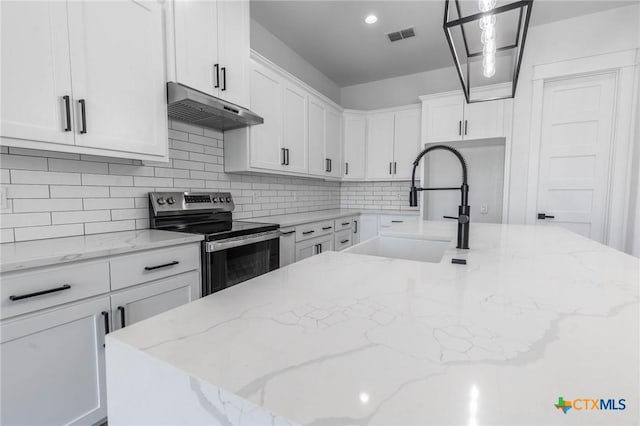 kitchen with stainless steel electric stove, a sink, decorative backsplash, white cabinets, and under cabinet range hood