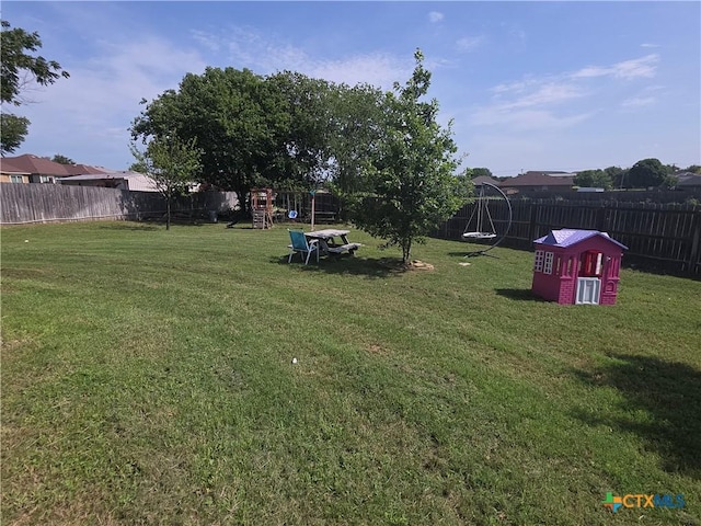 1212 Redstone Dr, Temple, TX 76502 - fenced backyard with a playground