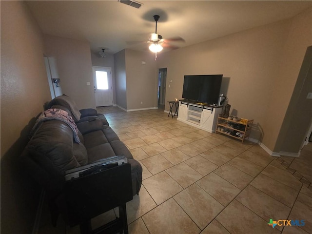 1212 Redstone Dr, Temple, TX 76502 - living room with light tile patterned floors and a ceiling fan