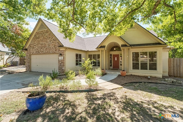 view of front of property with a garage