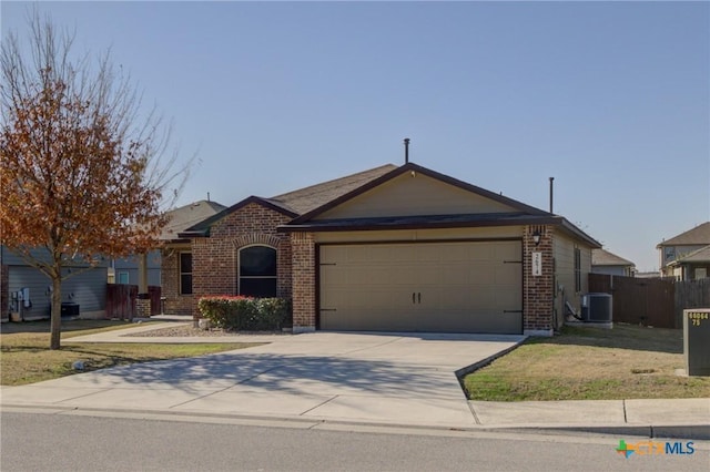 single story home with central AC unit, fence, concrete driveway, an attached garage, and brick siding